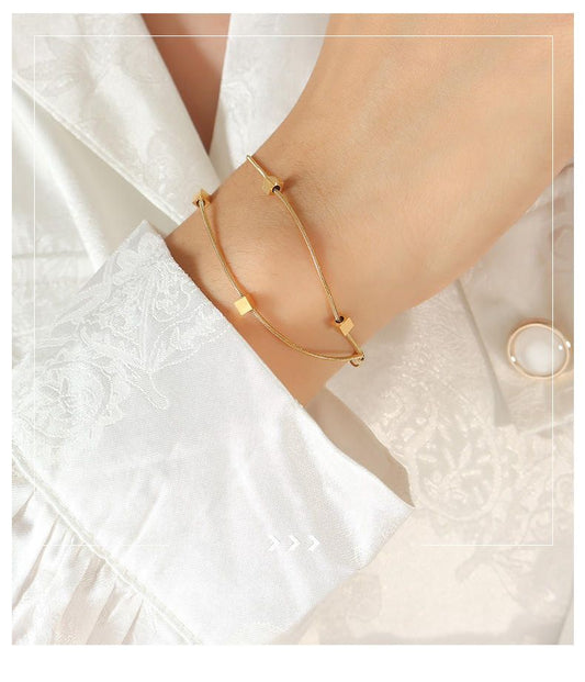 Modern Gold Geometric Bracelet with Square Beads