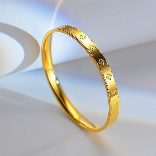 Elegant Gold-Plated Floral Engraved Bangle