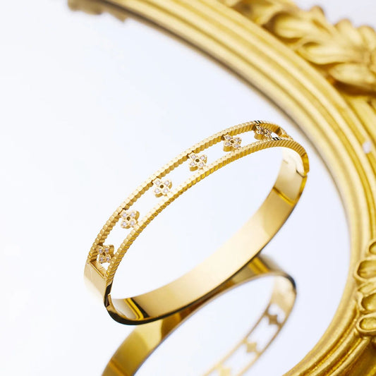 Designer Gold Bangle with Floral Motif and Diamond Accents