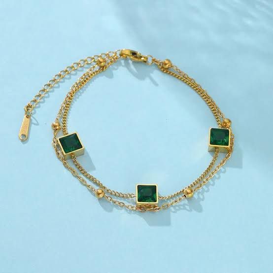 Elegant Gold Bracelet with Green Square Gemstones