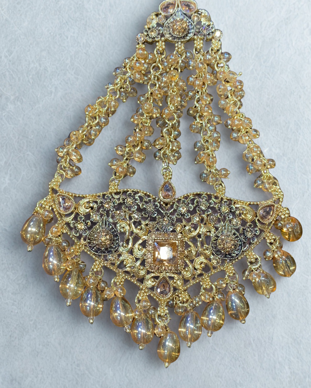 Stunning Gold and Amber Crystal Jhoomer with Intricate Detailing